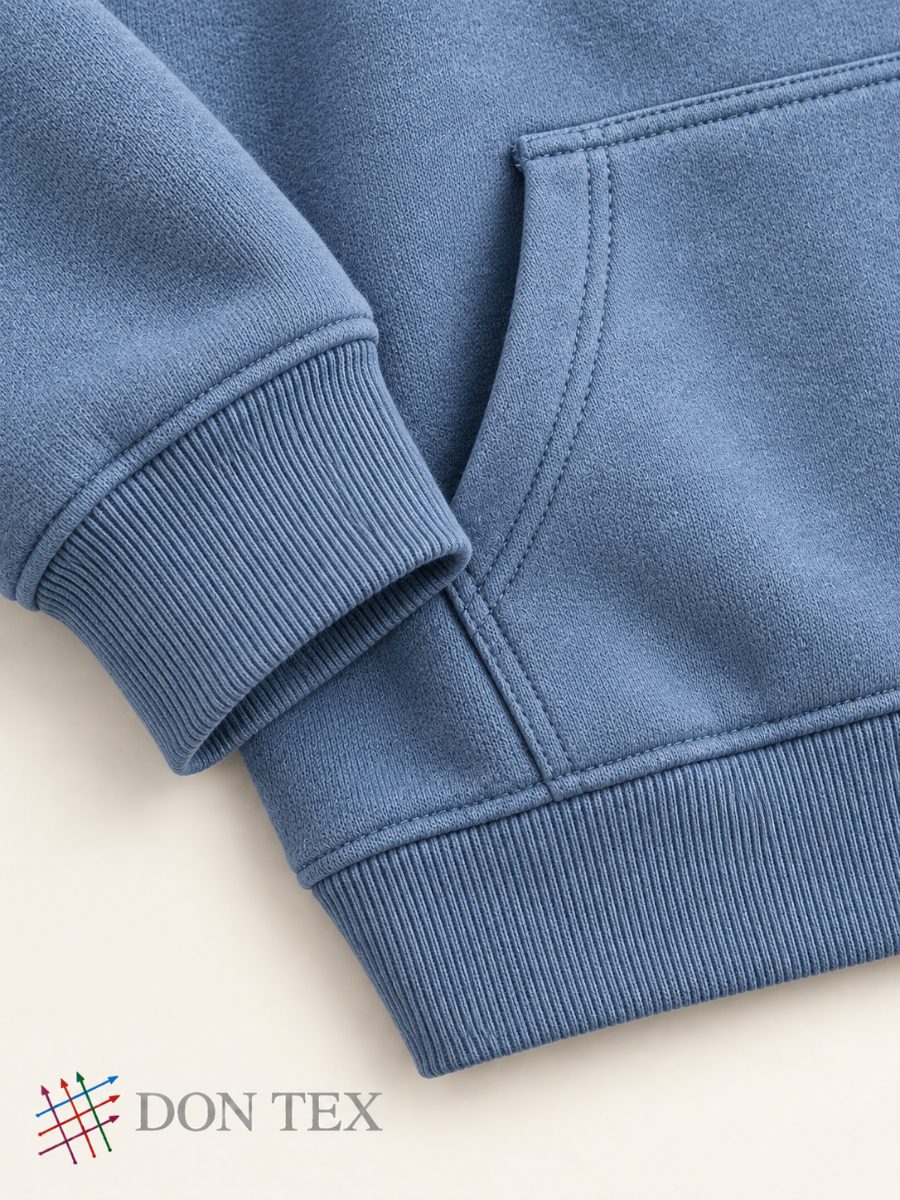 Kangaroo pocket and rib cuff on a boys’ hoodie