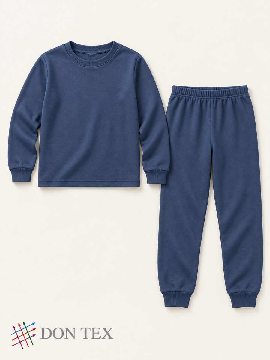Boys’ knitted pyjama set in navy, front view