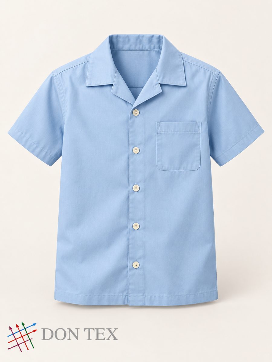 Boys’ woven camp-collar shirt in sky blue, front view