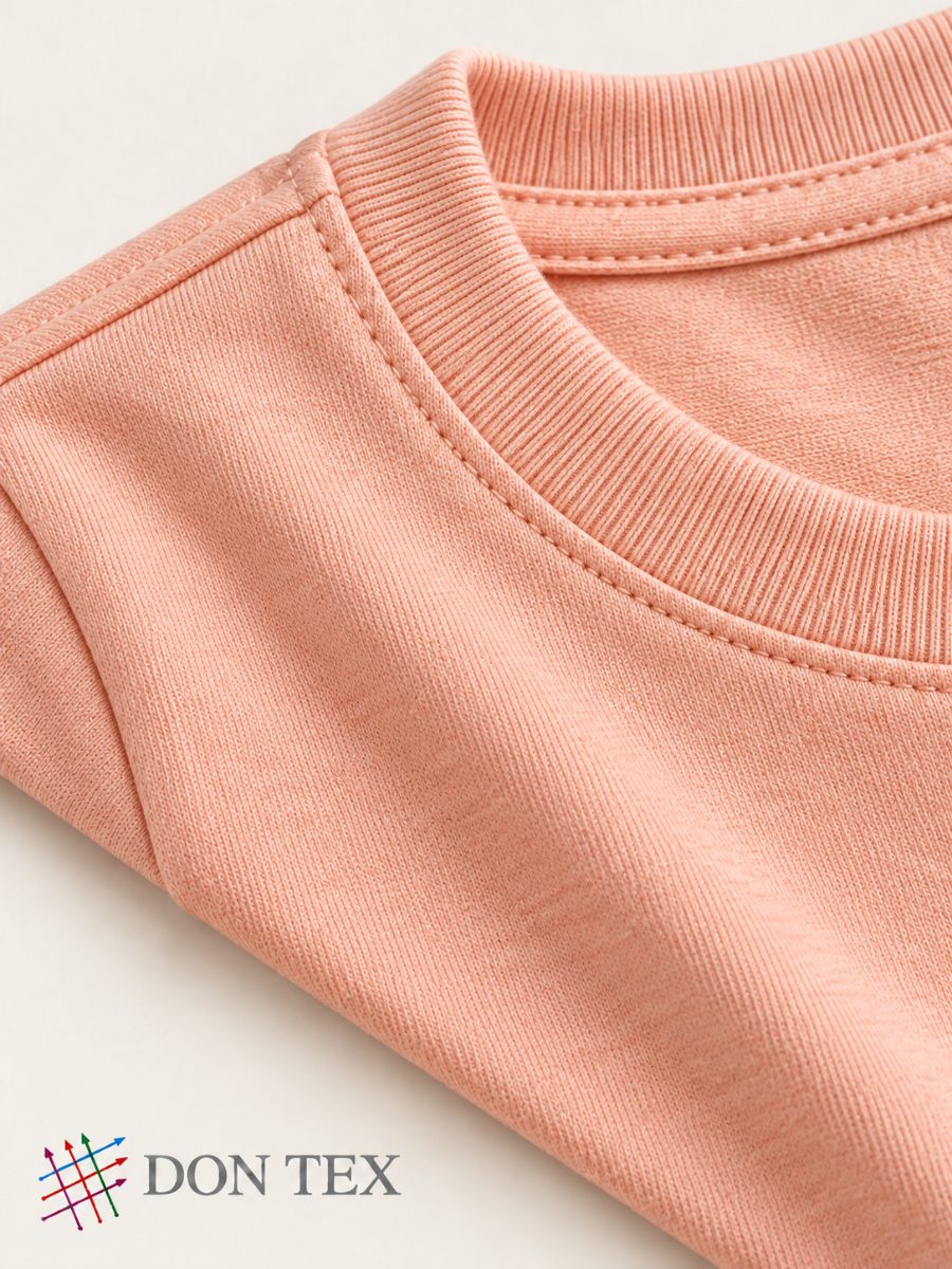 Rib neckband on peach jersey